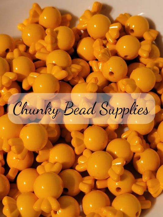Perles acryliques bonbons dorés 20 mm
