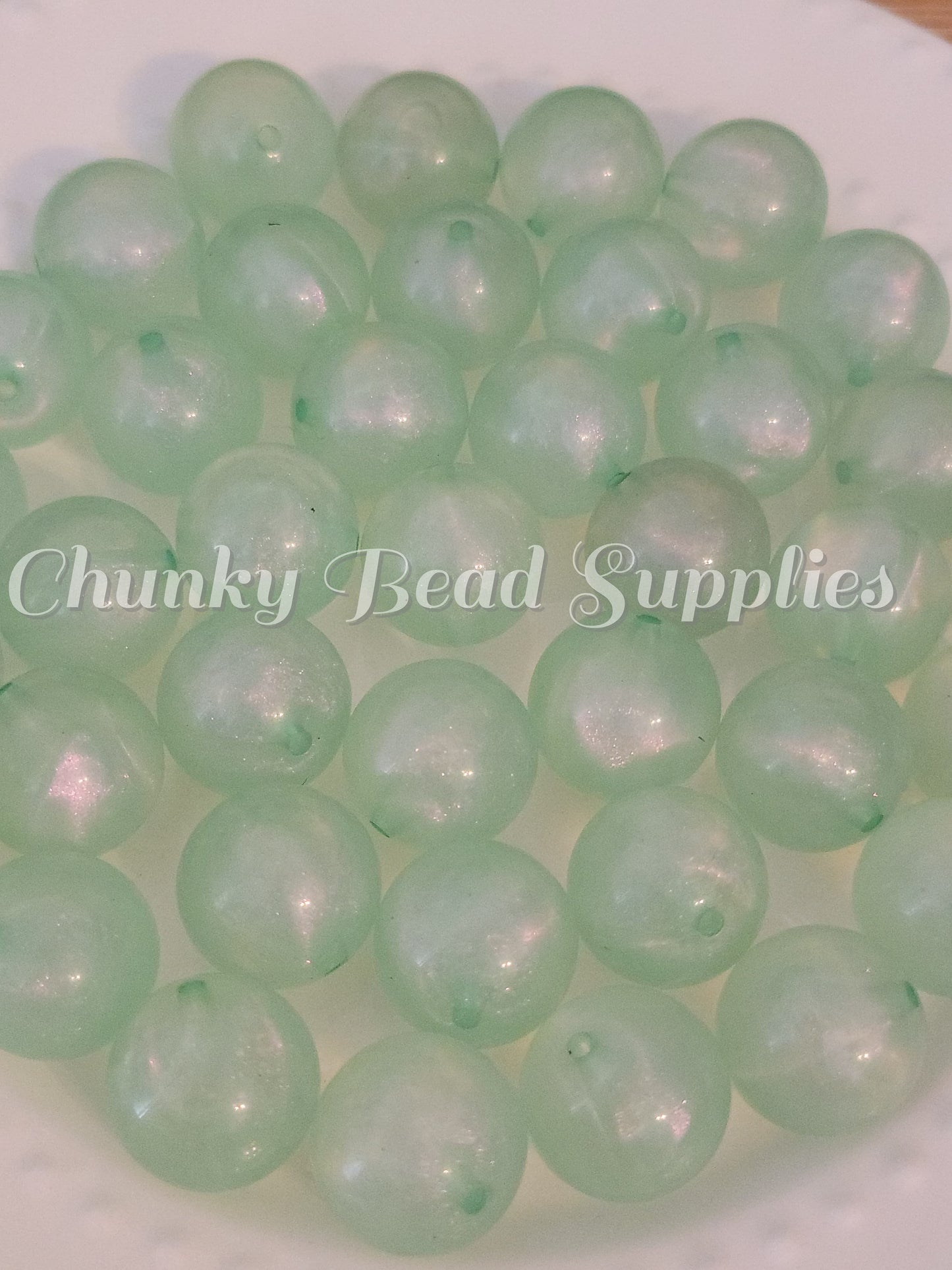 Perles pailletées intégrées de 20 mm.